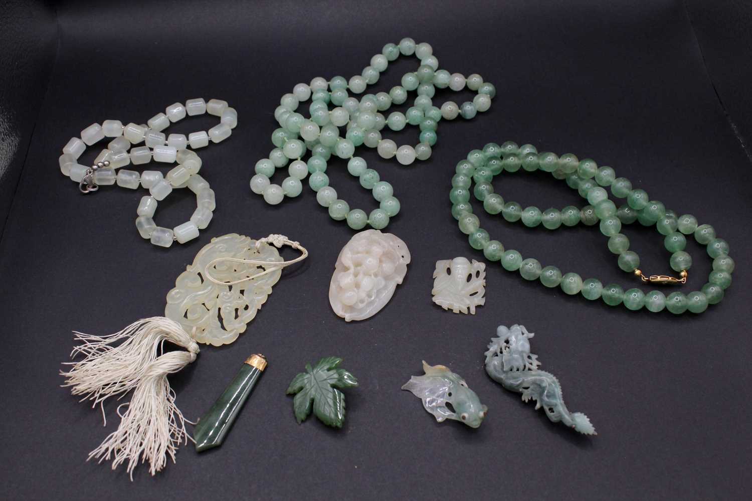 Lot 2050 - A group of ten Chinese jade ornaments, Qing...