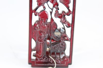 Lot 2051 - A Chinese carved amber ‘immortal and deer’...