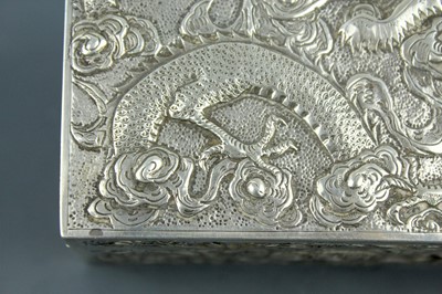 Lot 2063 - A Chinese silver ‘dragon’ box with hinged...