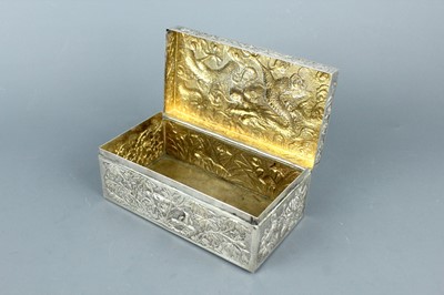 Lot 2063 - A Chinese silver ‘dragon’ box with hinged...