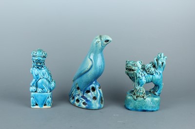 Lot 2110 - Three Chinese blue-glazed porcelain figures,...