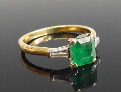 Lot 2510 - A yellow and white metal, emerald and diamond...