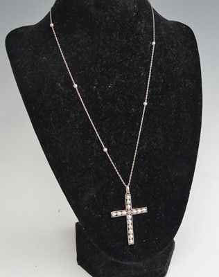 Lot 2520 - A white metal pearl and diamond cross pendant,...