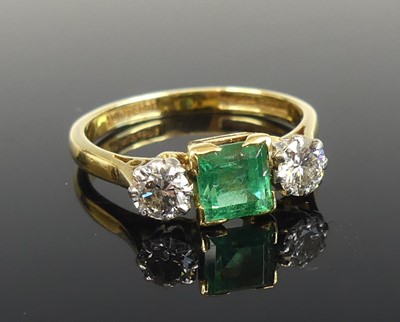 Lot 2576 - A yellow and white metal emerald and diamond...