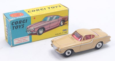 Lot 1256 - Corgi Toys No 228 Volvo P1800 comprising a tan...
