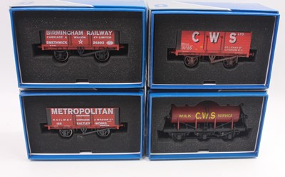 Lot 202 - Five Dapol 0 gauge wagons to include a 7 plank...