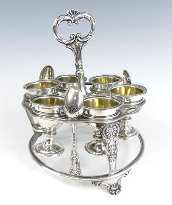 Lot 2077 - A George IV silver six-cup egg cruet, the...