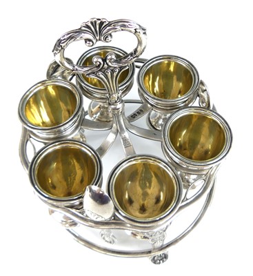 Lot 2077 - A George IV silver six-cup egg cruet, the...