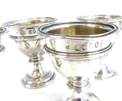 Lot 2077 - A George IV silver six-cup egg cruet, the...