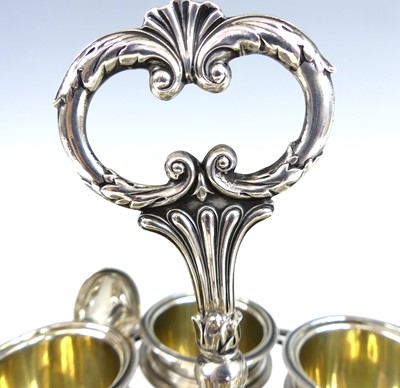 Lot 2077 - A George IV silver six-cup egg cruet, the...