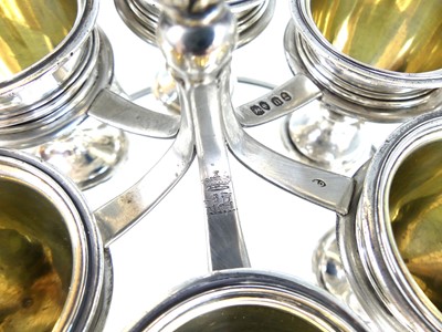 Lot 2077 - A George IV silver six-cup egg cruet, the...