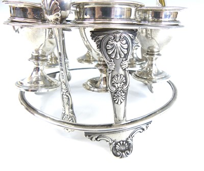 Lot 2077 - A George IV silver six-cup egg cruet, the...