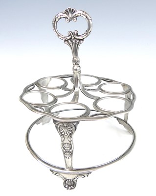 Lot 2077 - A George IV silver six-cup egg cruet, the...
