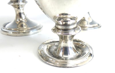 Lot 2077 - A George IV silver six-cup egg cruet, the...