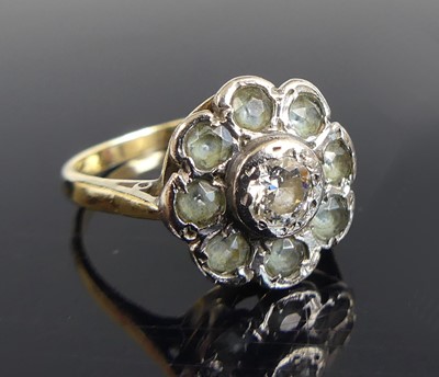 Lot 2566 - A yellow and white metal diamond and blue gem...