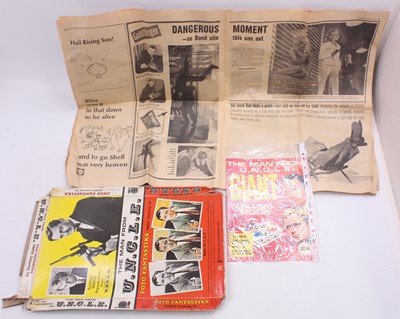 Lot 1354 - A collection of Man from UNCLE ephemera to...