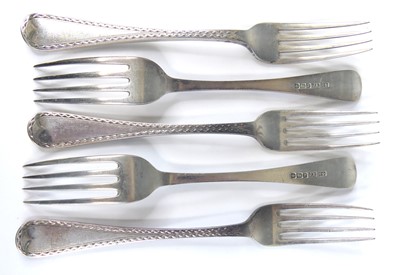 Lot 2057 - A set of five silver forks, in the Old English...