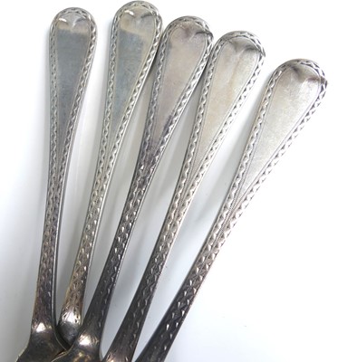 Lot 2057 - A set of five silver forks, in the Old English...