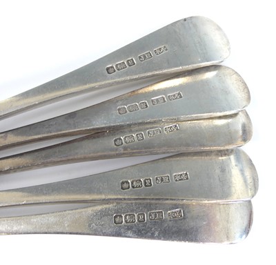 Lot 2057 - A set of five silver forks, in the Old English...