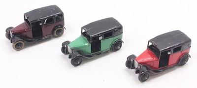 Lot 1121 - Dinky Toys No.36G Taxi group, 3 examples, to...