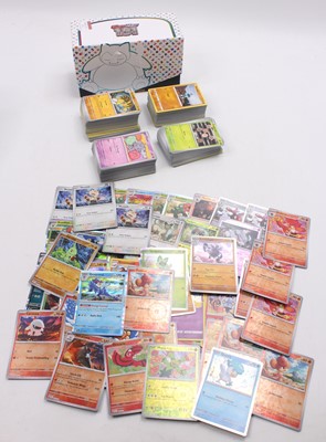 Lot 1552 - Pokemon ETB containing 400 various common and...