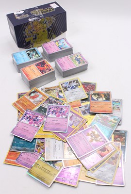 Lot 1384 - Pokemon ETB containing 400 various common and...