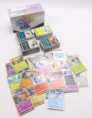 Lot 1386 - Pokemon ETB containing 400 various common and...