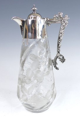 Lot 2035 - An Edwardian silver topped glass claret jug,...