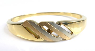 Lot 2663 - A yellow, white, and rose metal hinged hollow...