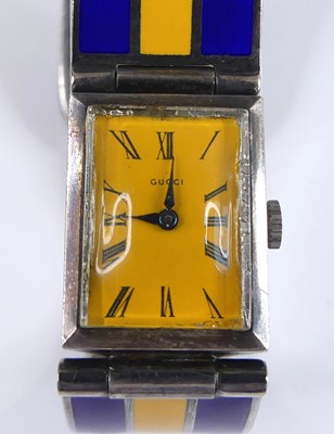 Lot 2602 - A Gucci silver and enamel bracelet watch,...