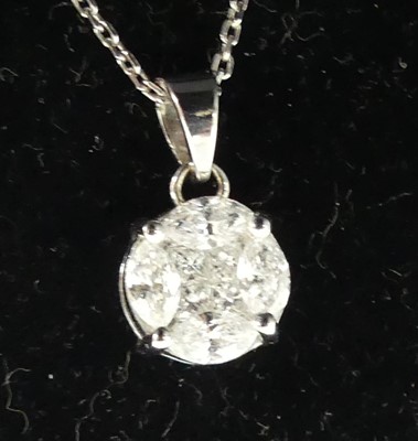 Lot 2606 - A contemporary 18ct white gold diamond pendant,...