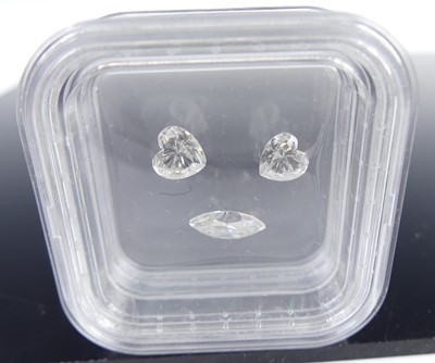 Lot 2532 - Three lab-grown loose diamonds, with AGL...