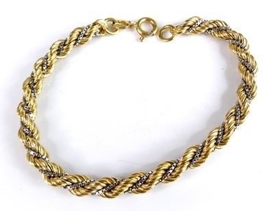 Lot 2535 - A modern 18ct gold rope twist bracelet...