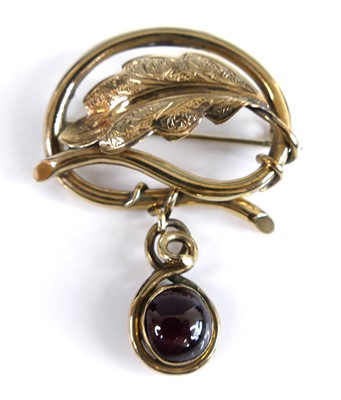 Lot 2553 - A yellow metal brooch in the form of an...