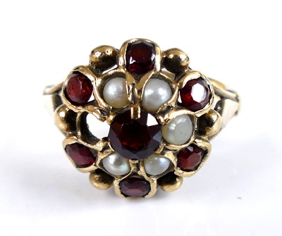 Lot 2562 - A 9ct yellow gold garnet and pearl circular...