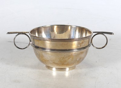 Lot 233 - An Edwardian silver sugar bowl of twin handled...