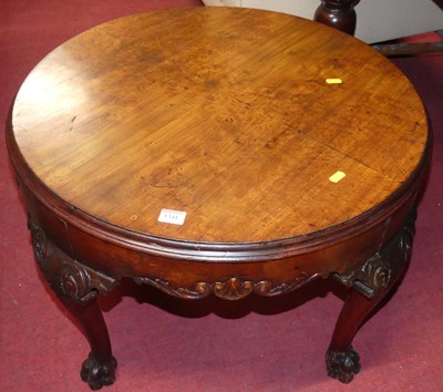 Lot 1240 - A walnut circular low occasional table raised...