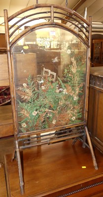 Lot 1216 - An early 20th century bamboo and glass inset...
