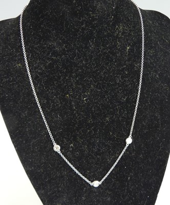 Lot 2690 - A white metal 'Portfolio' oval trace link...