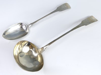 Lot 2040 - A Georgian Irish silver soup ladle and serving...