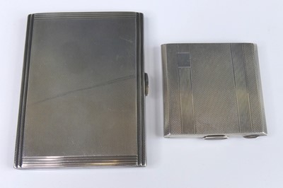 Lot 117 - A late Art Deco silver engine turned pocket...