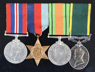 Lot 3297 - A group of four medals to include WW II War...