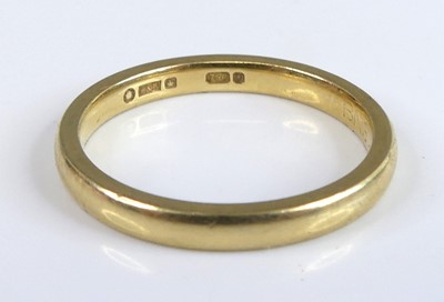Lot 2784 - A contemporary 18ct gold wedding band, sponsor...