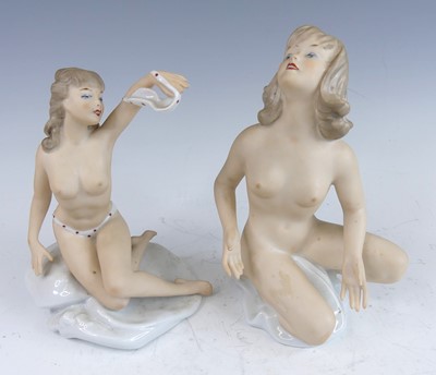Lot 59 - Two female nude porcelain figures by...