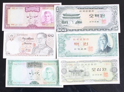 Lot 2275 - World, a collection of banknotes to include...
