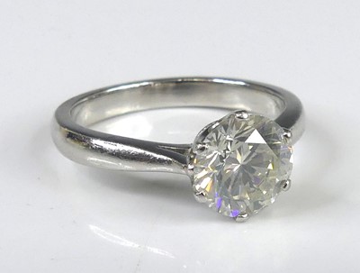 Lot 2116 - A platinum, diamond solitaire ring, featuring...