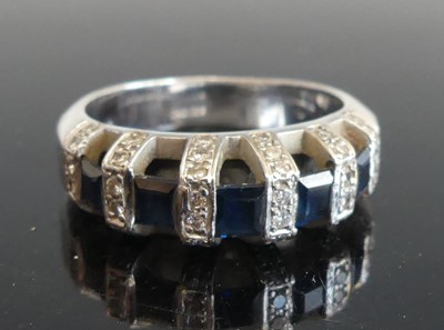 Lot 2801 - A white metal sapphire and diamond half...