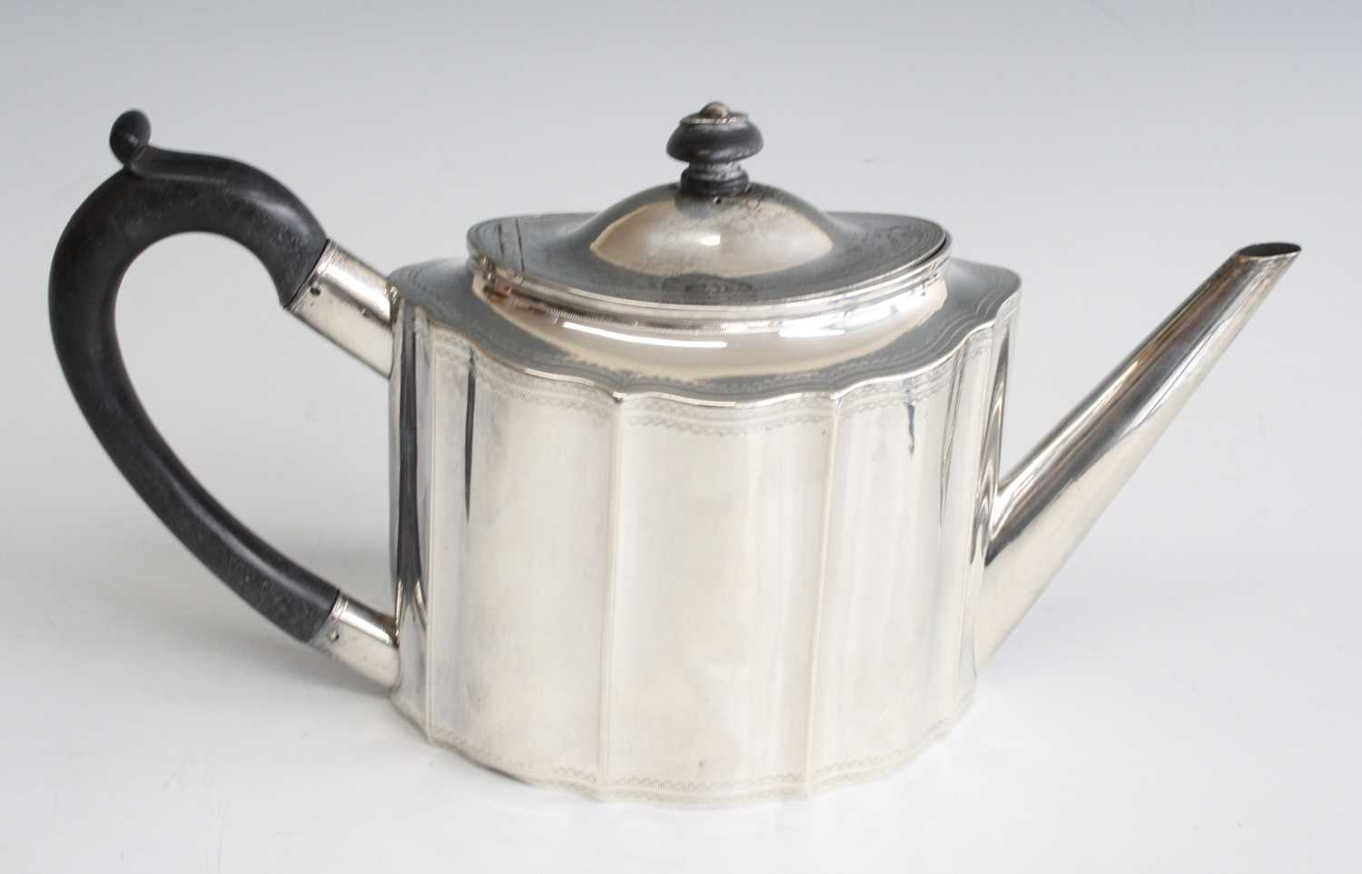 Lot 2070 - A George III silver saffron teapot, of shaped...