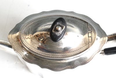 Lot 2070 - A George III silver saffron teapot, of shaped...