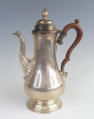 Lot 2087 - An Elizabeth II silver coffee pot in the early...